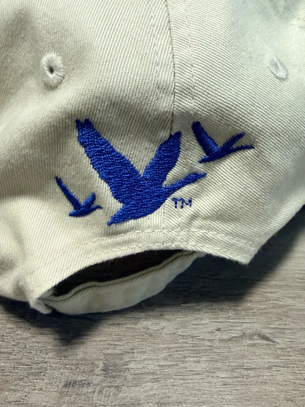 Grey Goose Cream Baseball Cap with Blue Embroidered Text